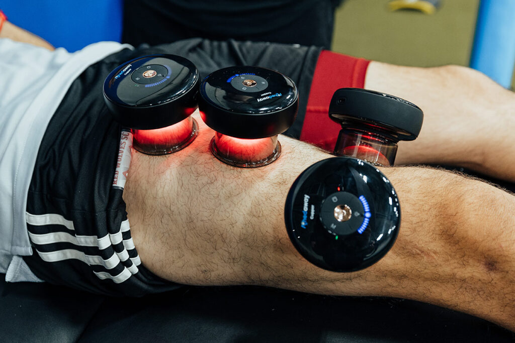 Athlete undergoing red light therapy